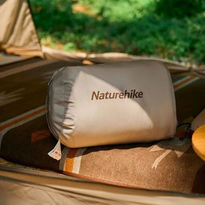 sac de couchage dans sac de rangement