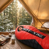 sac-de-couchage-grand-froid-femme-dort-dans tente